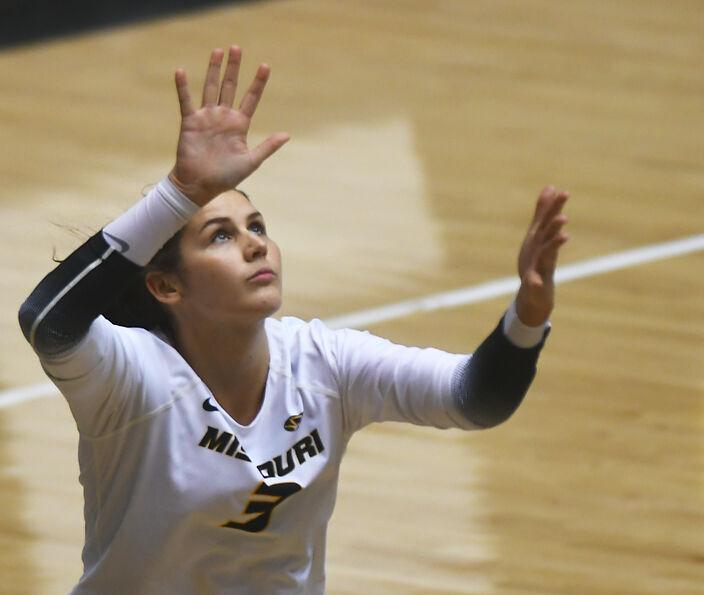 Anna Dixon serves